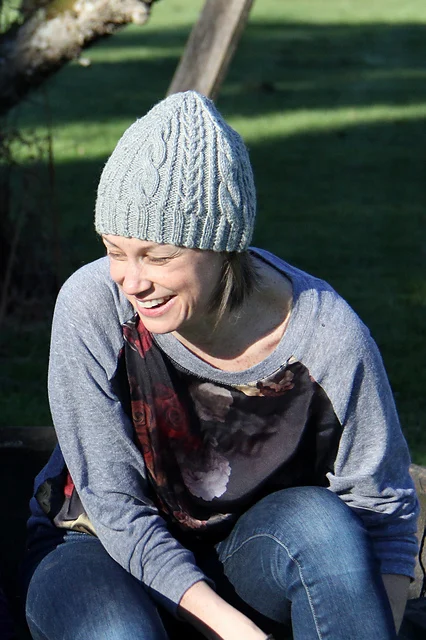 Winter Skies knitted hat displayed showing detailed cable construction and textured stitchwork