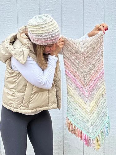 Shaina Bilow Designs displaying the Après Ski shawl, a versatile layering piece with textured stitchwork perfect for mountain lifestyle