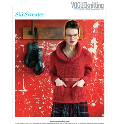 Model wearing Vogue Knitting's Ski Sweater, a classic pullover with pockets and an exaggerated collar